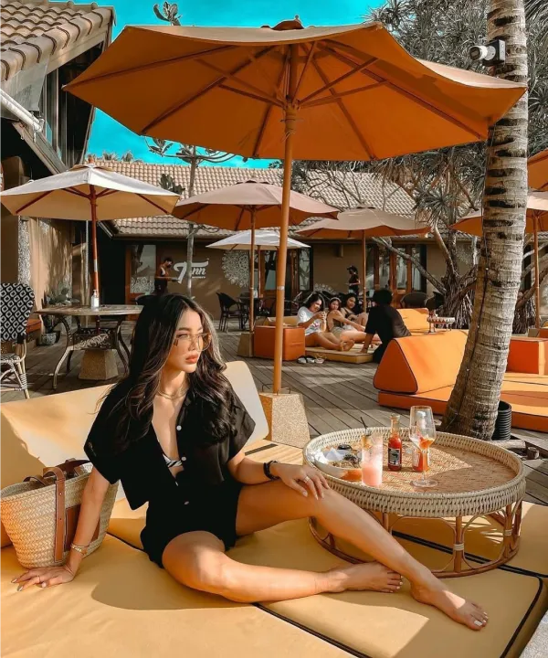 Tann Beach Club Girl On Sofa